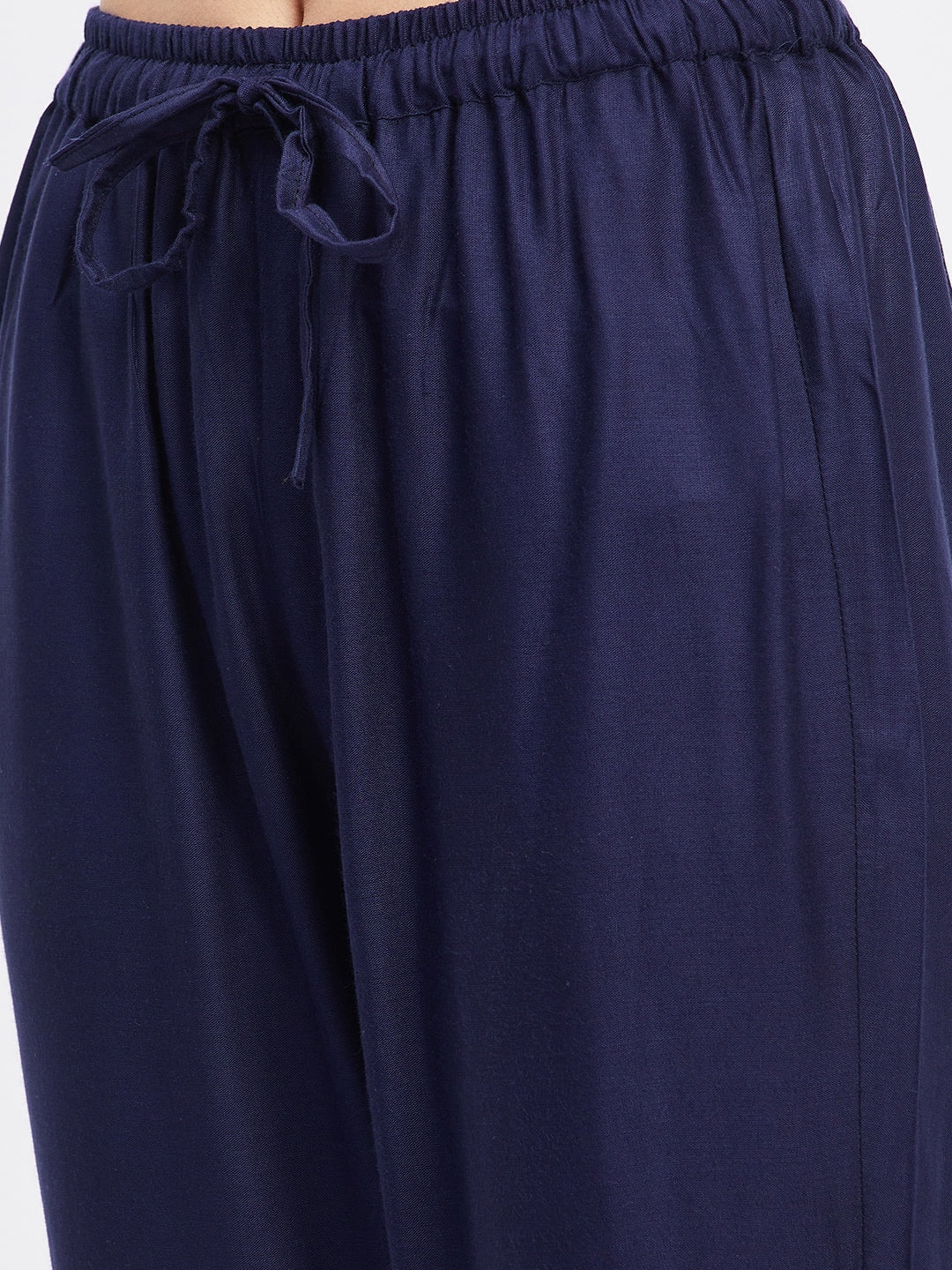 Navy Blue Solid Rayon Straight Palazzo with elastic waistband and drawstring.