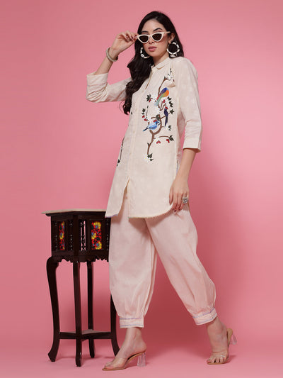 Off-white printed shirt with Afghani salwar co-ord set, featuring embroidered kurti and elastic waistband.