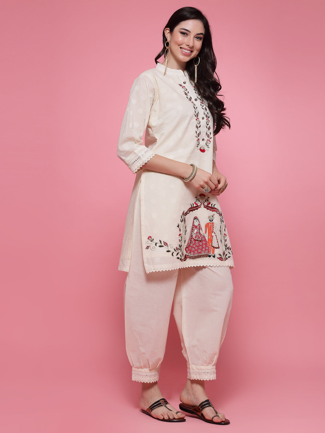 Off-white embroidered shirt with Afghani salwar co-ord set.