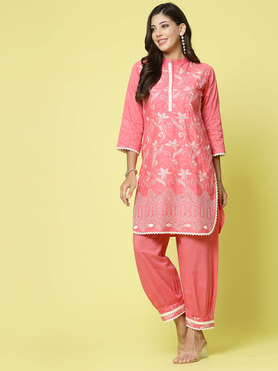 Women embroidered kurta with Afghani pants co-ords set featuring mandarin collar and three-quarter sleeves.