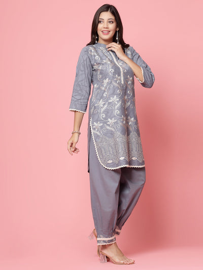 Women embroidered kurta with Afghani pants set featuring three-quarter sleeves and Mandarin collar.