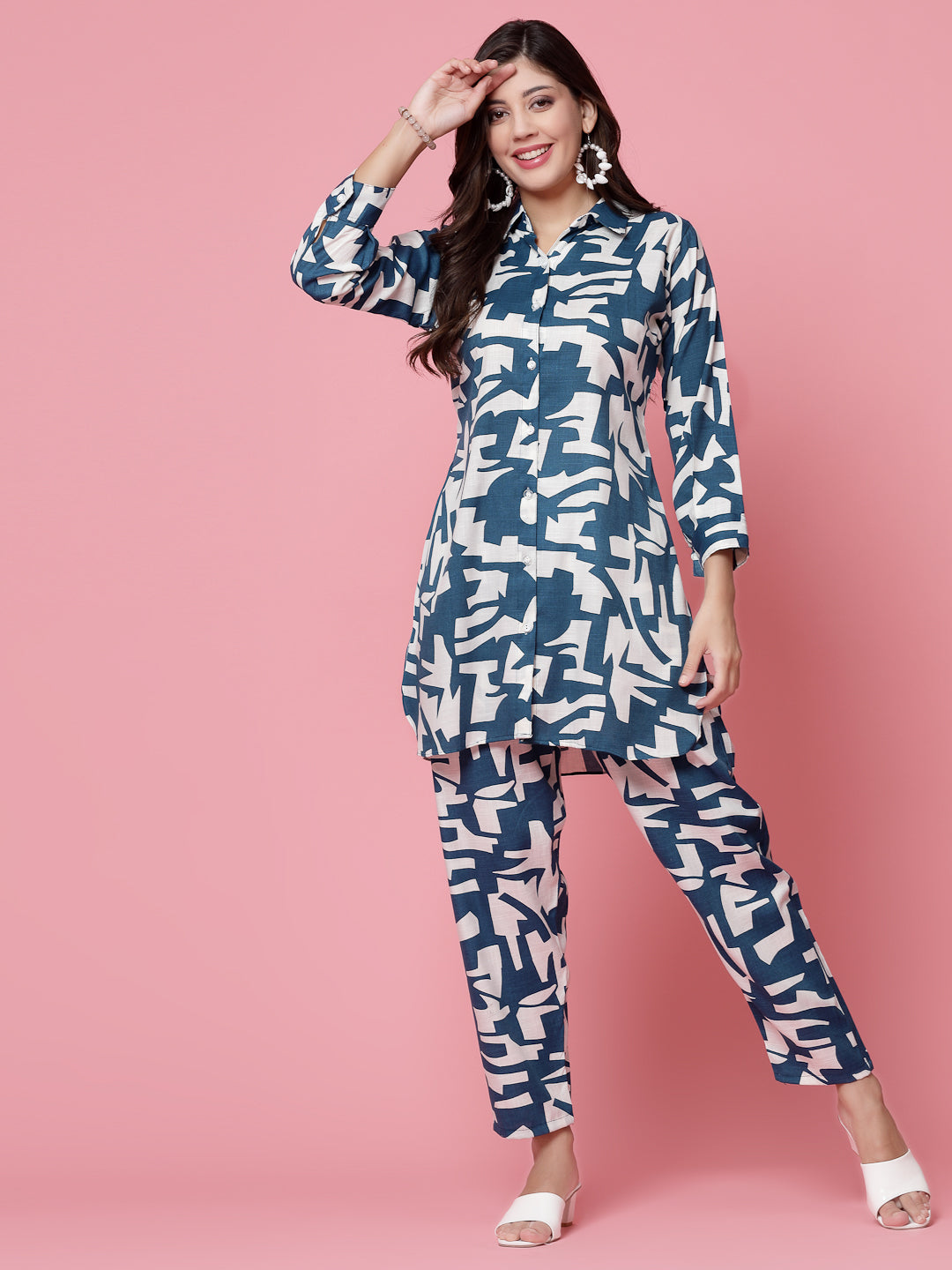 Women printed shirt and palazzo co-ords set with three-quarter sleeves and elastic waistband.