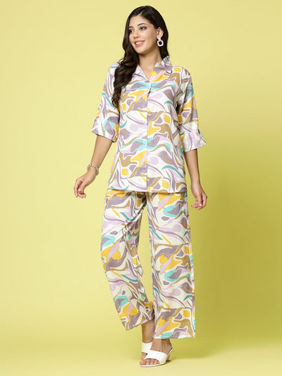 Women abstract printed shirt with palazzo co-ords set, featuring three-quarter sleeves and elastic waistband.