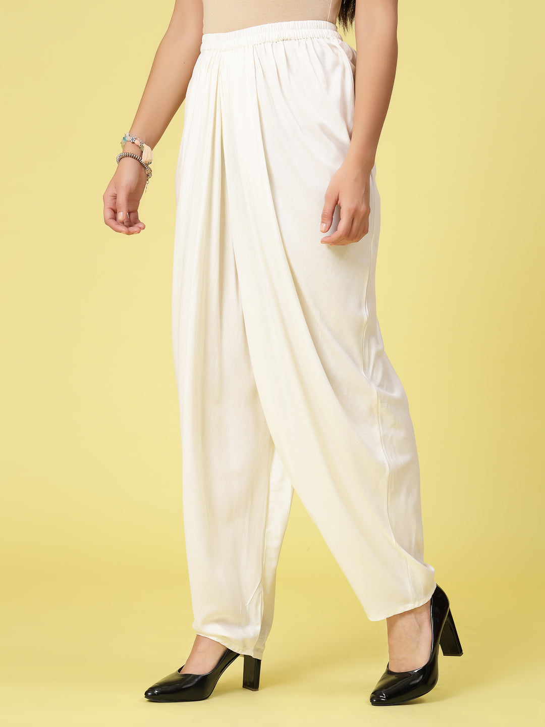 Women solid rayon dhoti salwar with elasticated waistband.