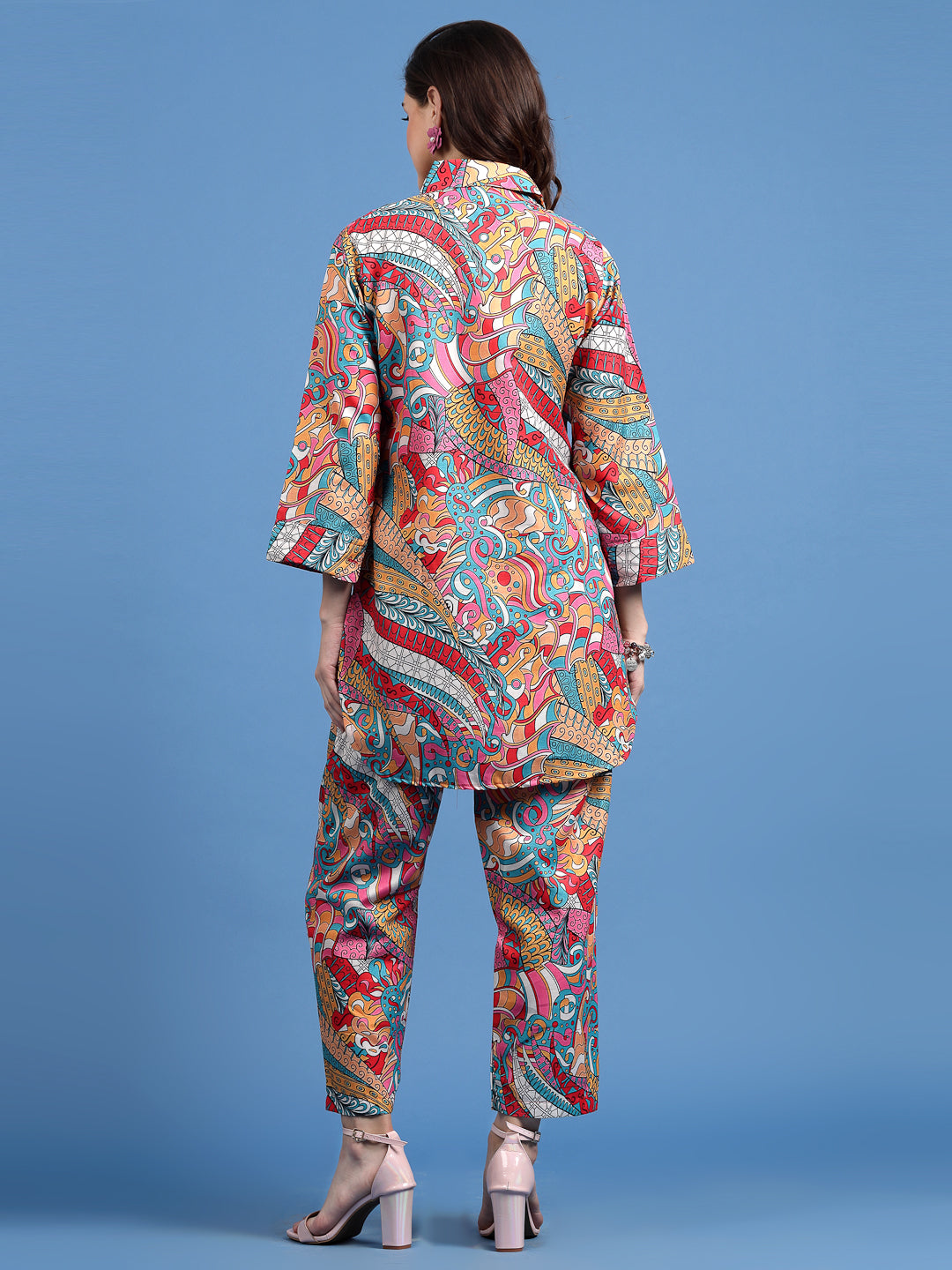 Women printed cotton co-ords with tunic and afghani trousers, vibrant colors, back view.