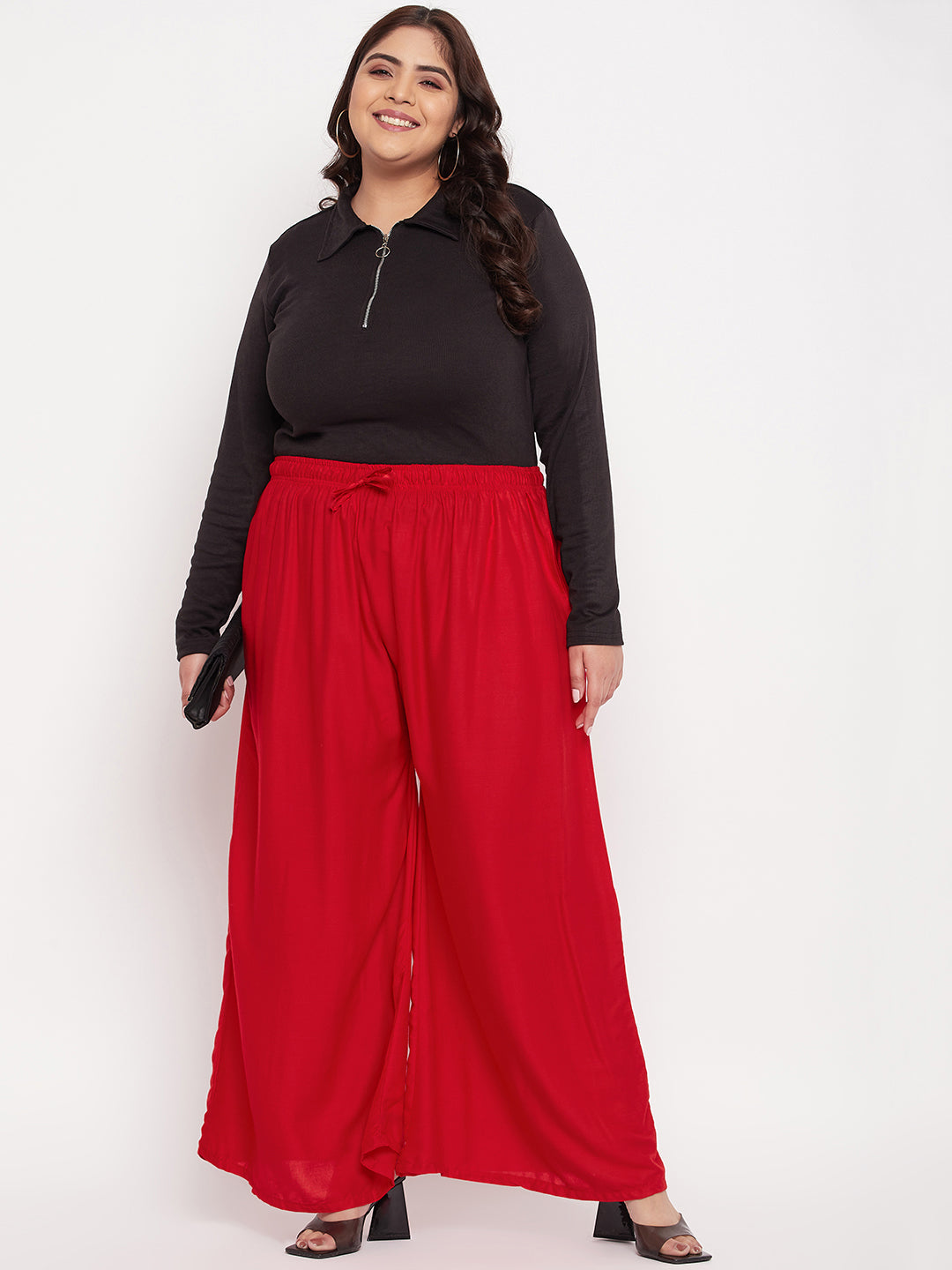 Red Solid Rayon Jumbo Sharara with elasticated waistband and drawstring.