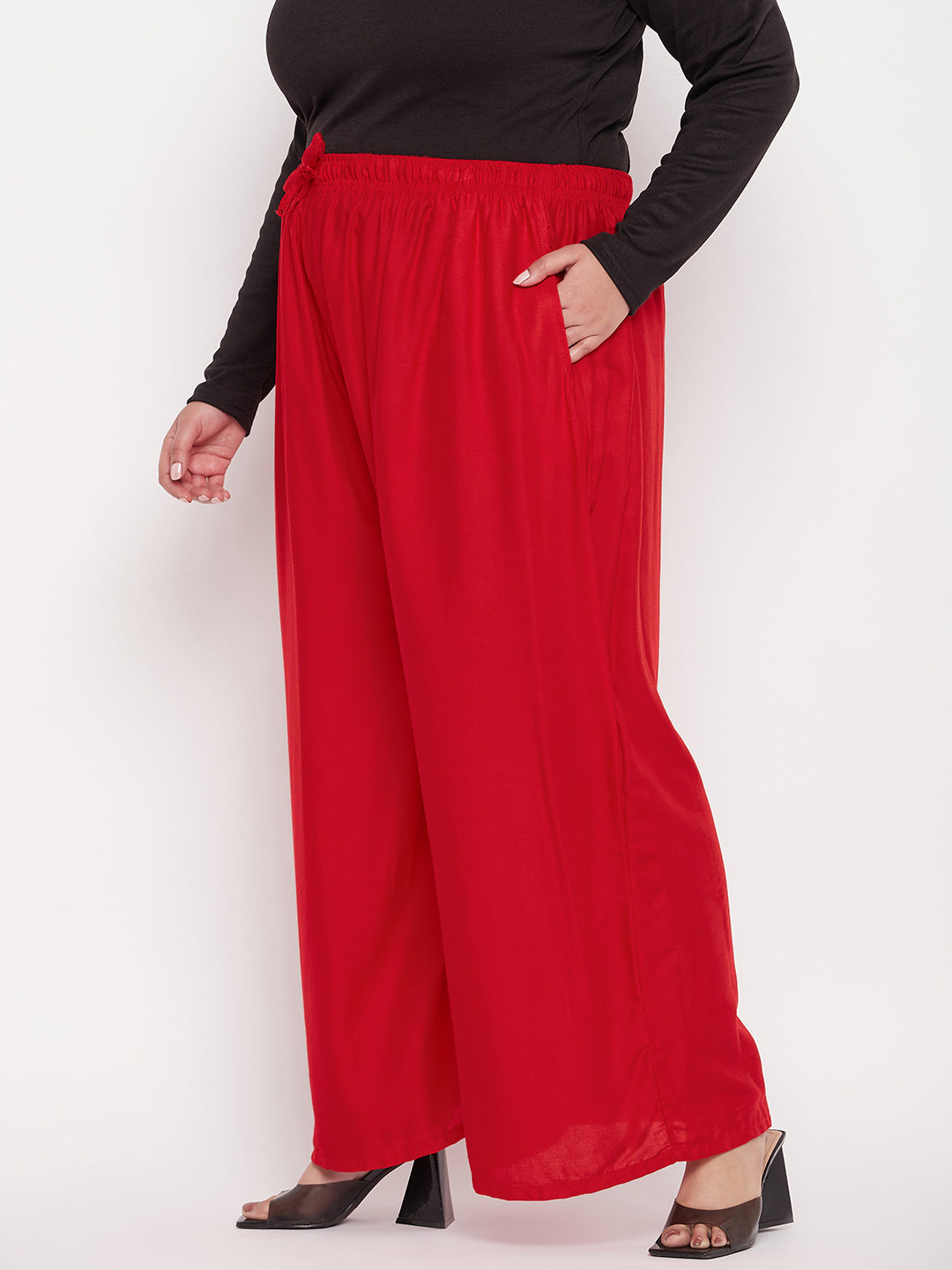 Red Solid Rayon Jumbo Sharara with elasticated waistband and drawstring.