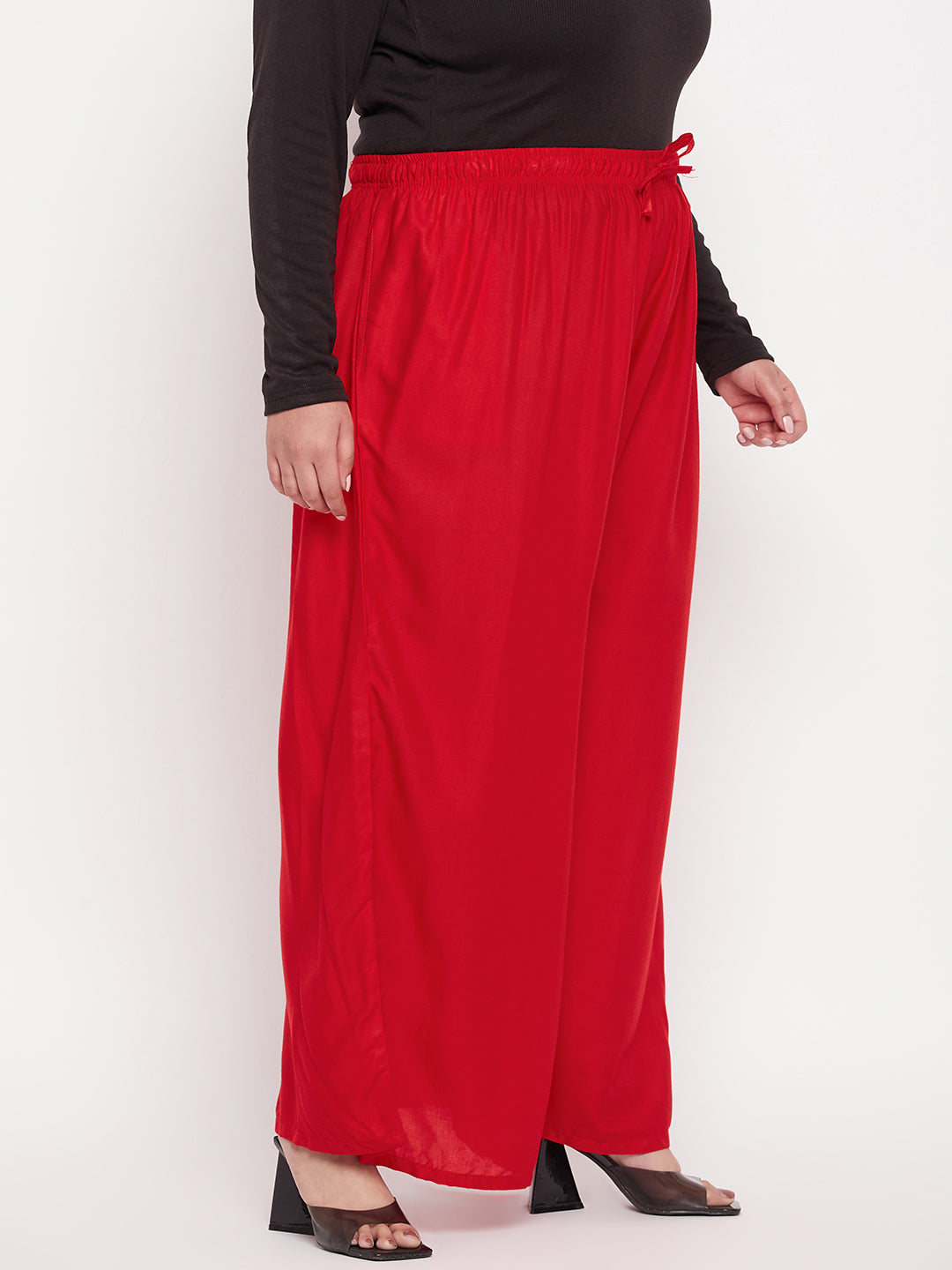 Red Solid Rayon Jumbo Sharara with elasticated waistband.