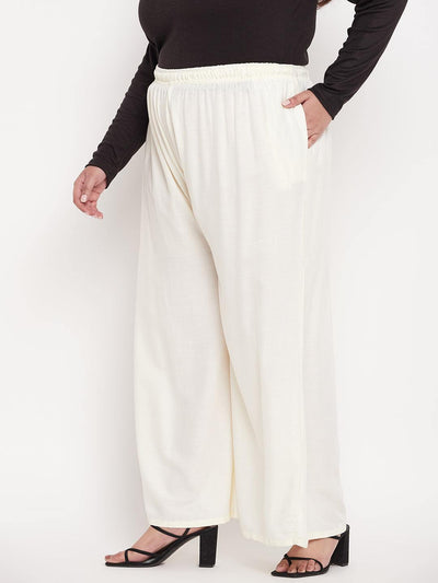 Off-White Solid Rayon Jumbo Sharara with elasticated waistband.