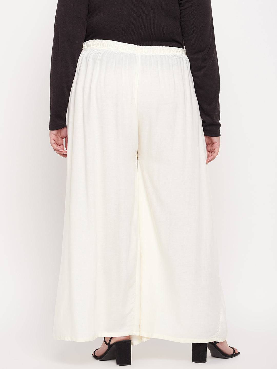 Off-White Solid Rayon Jumbo Sharara with elasticated waistband.