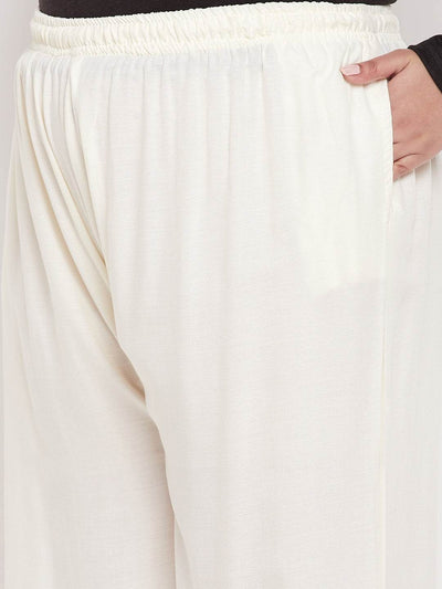 Off-White Solid Rayon Jumbo Sharara with elasticated waistband and drawstring.