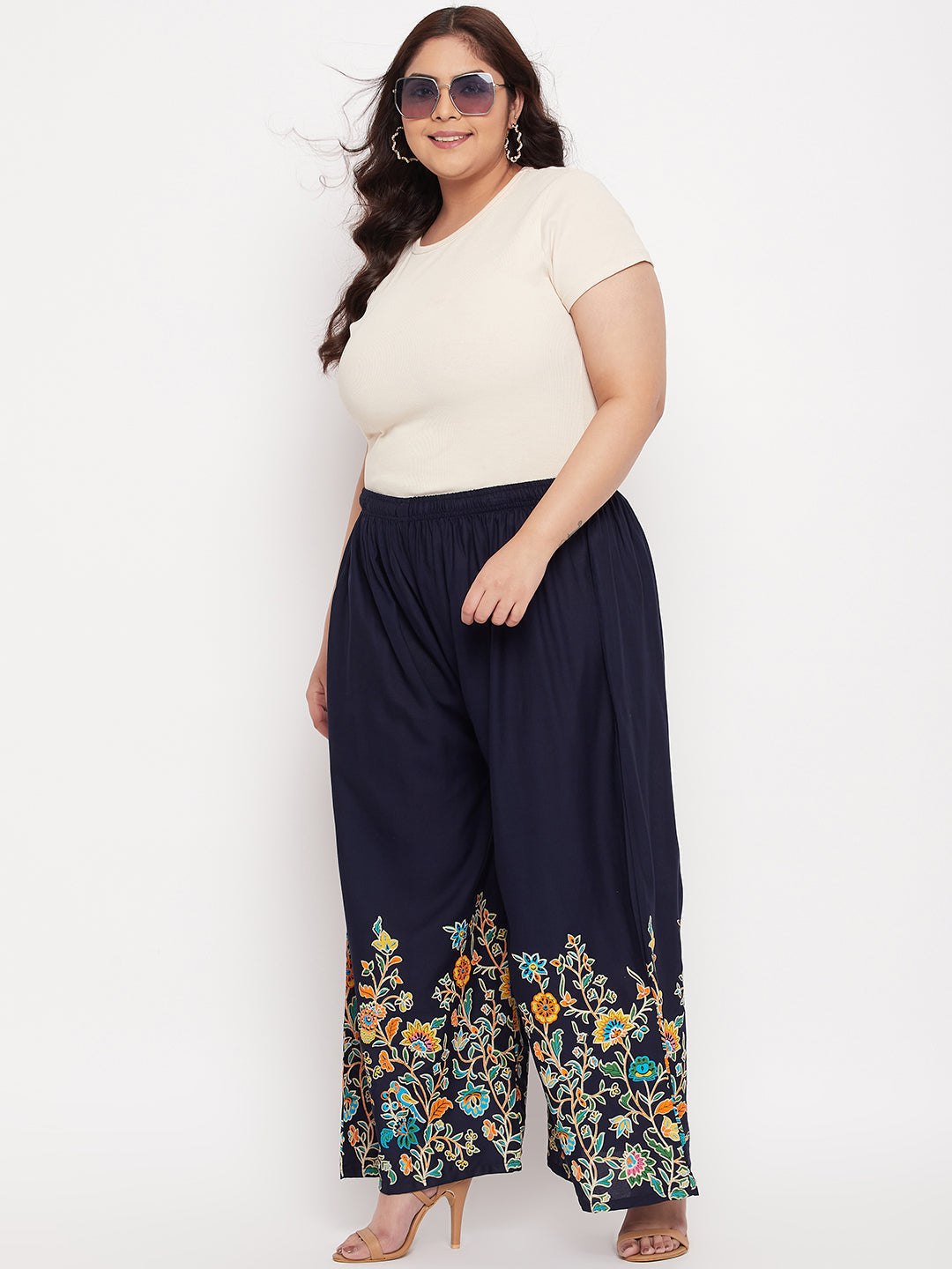 Navy blue printed rayon palazzo with elasticated waistband and drawstring.