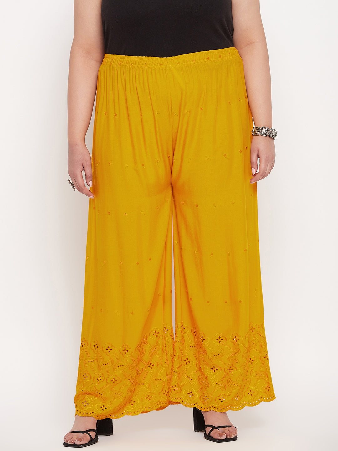 Mustard embroidered rayon palazzo with elasticated waistband and drawstring.