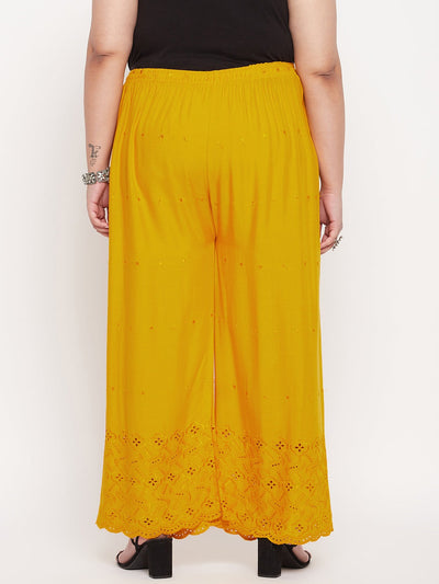 Mustard embroidered Chikankari rayon palazzo with elasticated waistband and drawstring.