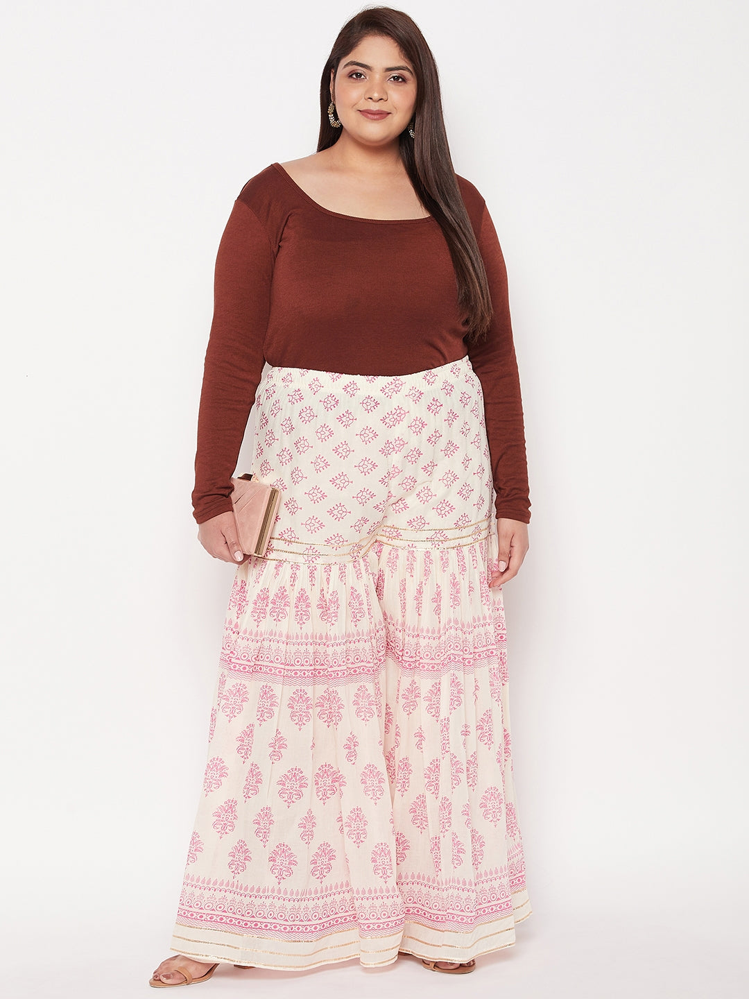 White & Magenta Printed Cotton Flared Gharara with elasticated waistband and drawstring.