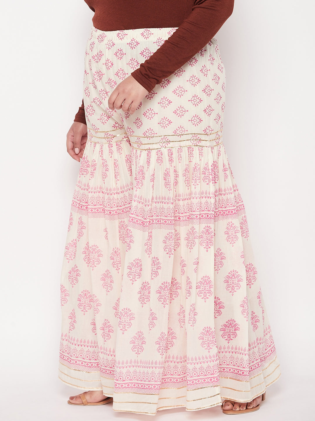 White and magenta printed cotton flared gharara with elastic waistband.