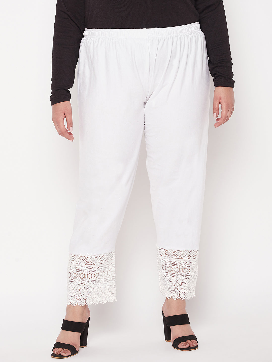 White solid lace palazzo with elastic waistband and drawstring.