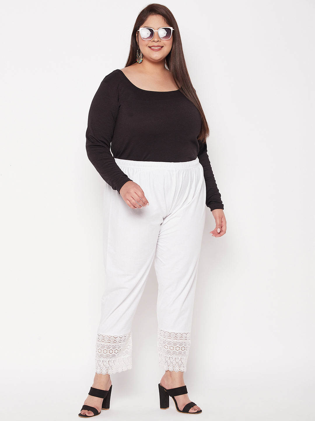 White solid lace palazzo with elasticated waistband and drawstring.