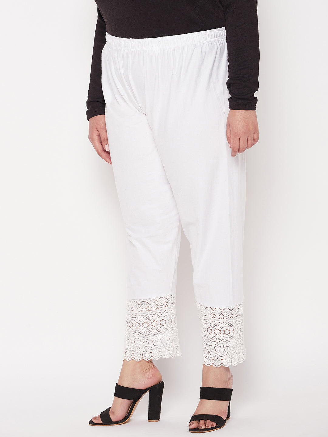 White solid lace palazzo with elasticated waistband and drawstring.