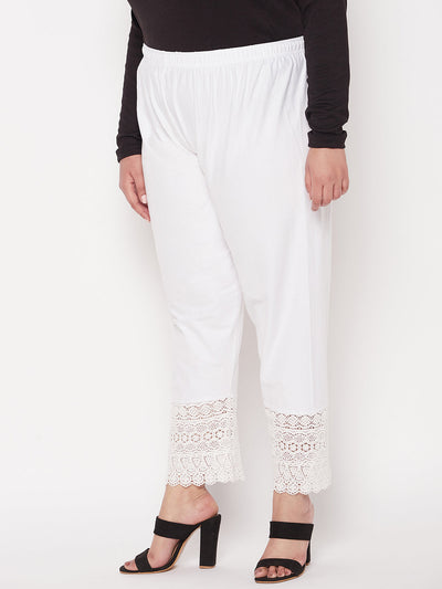 White solid lace palazzo with elasticated waistband and drawstring.