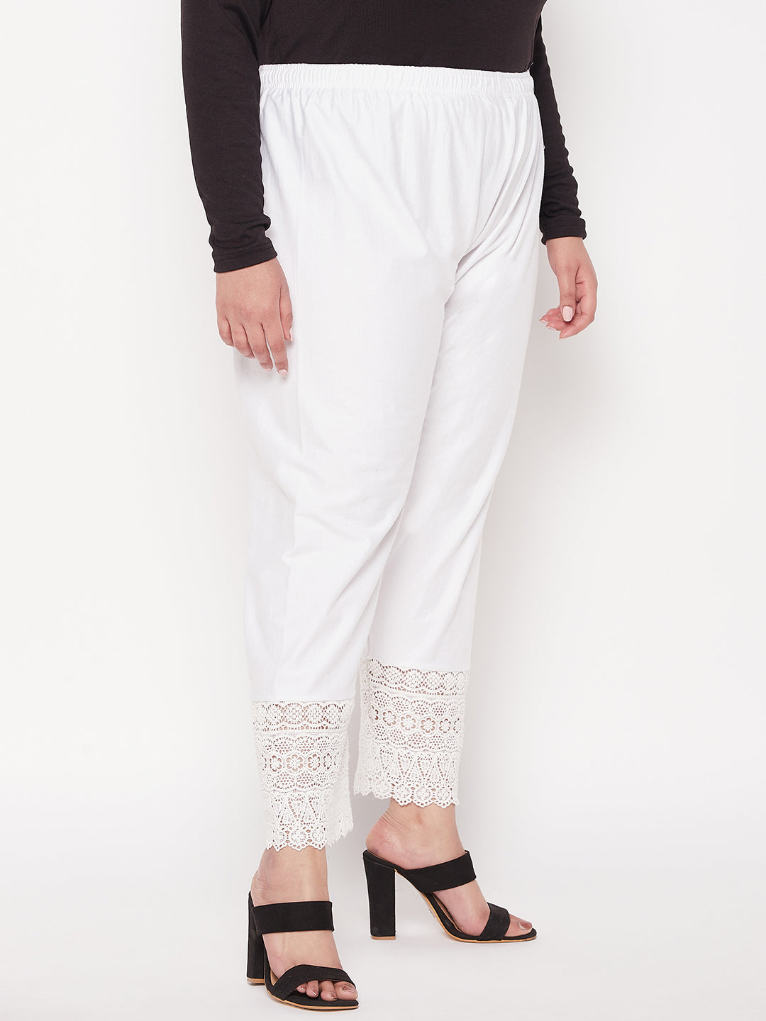 White solid lace palazzo with elasticated waistband and drawstring.