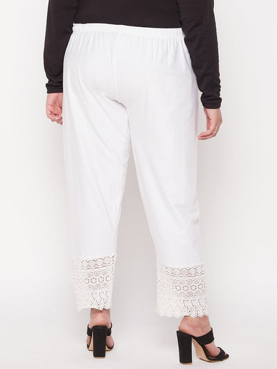 White solid lace palazzo with elasticated waistband and drawstring.