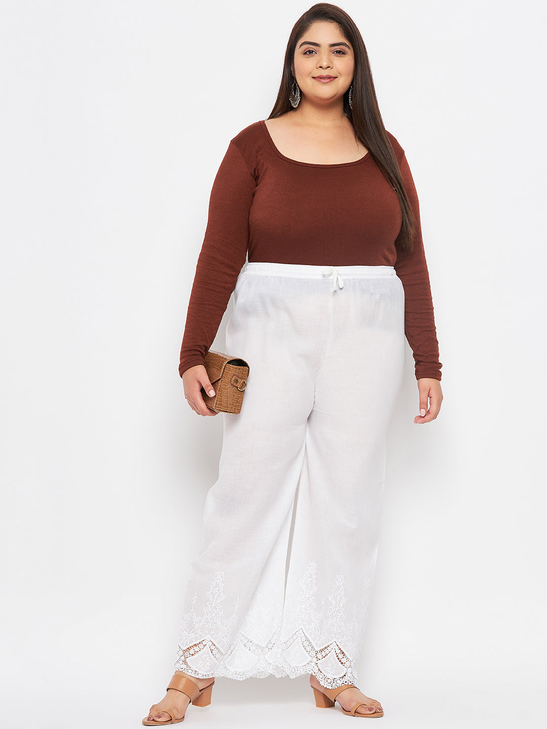 White embroidered cotton straight palazzo with lace hem and elastic waistband.