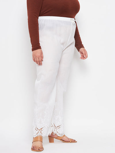 White embroidered cotton straight palazzo with lace hem and elastic waistband.