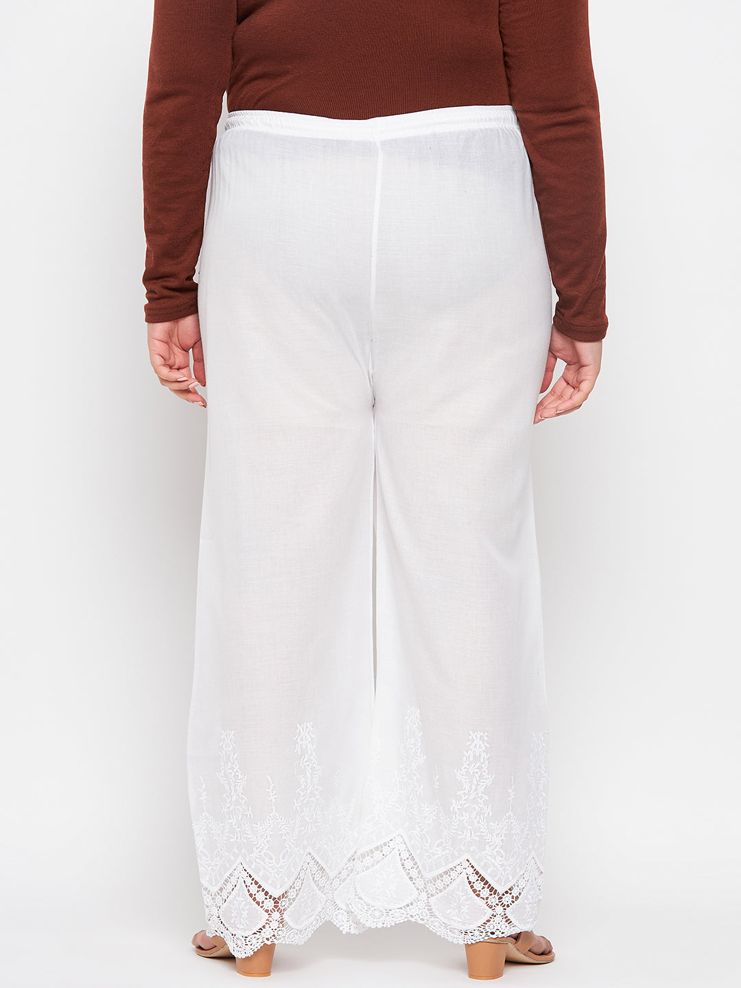 White embroidered cotton straight palazzo with lace hem and drawstring waistband.