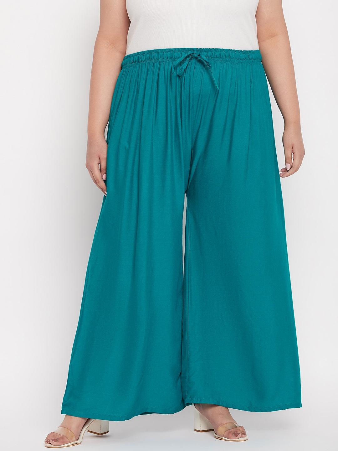 Rama Green Solid Rayon Palazzo with elasticated waistband and drawstring.