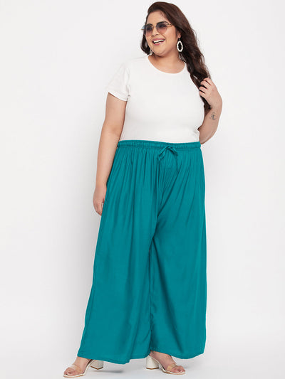 Rama Green Solid Rayon Palazzo with elasticated waistband and drawstring.