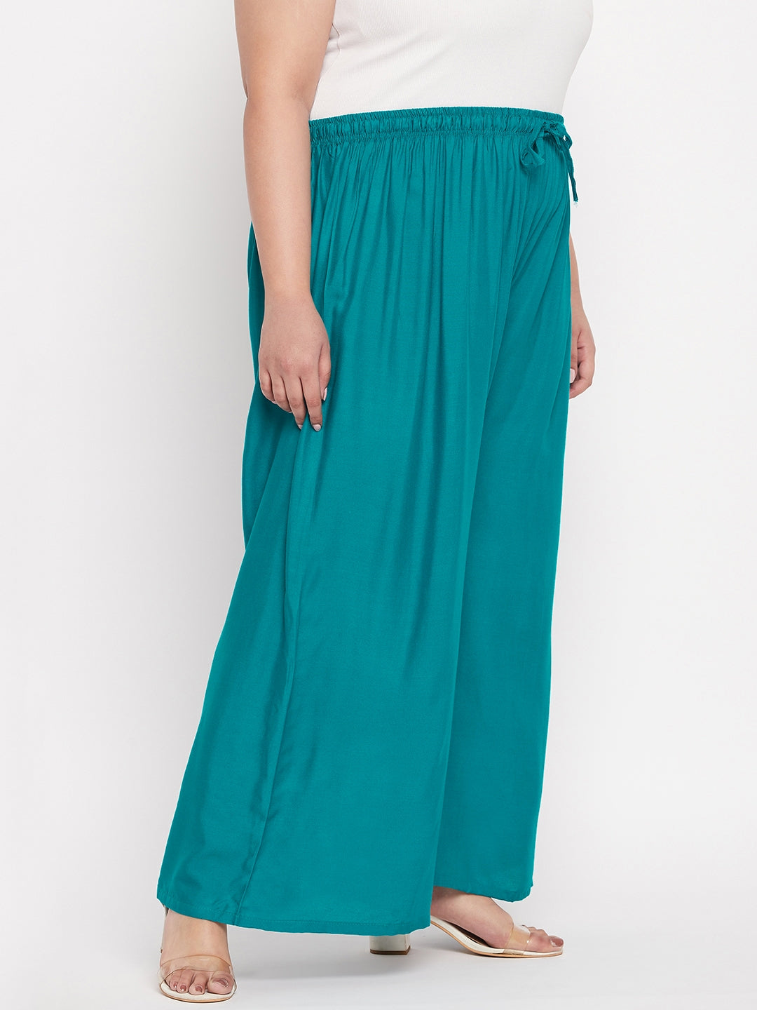 Rama Green Solid Rayon Palazzo with elasticated waistband and drawstring.