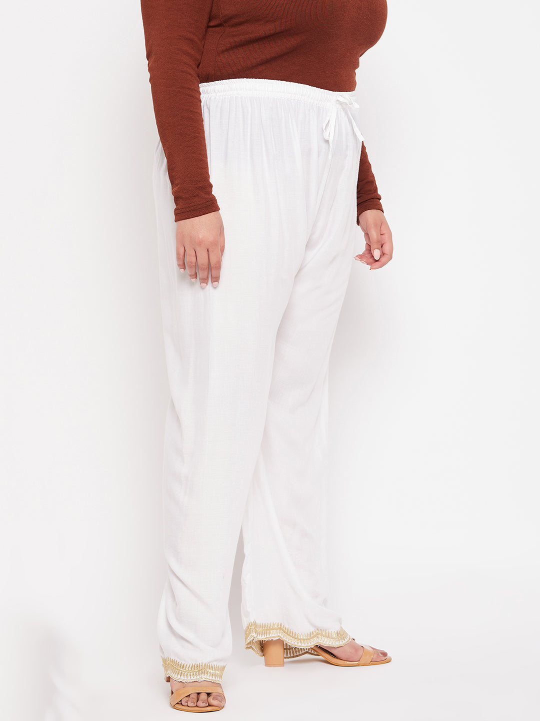 White hem design straight palazzo with elastic waistband and drawstring.