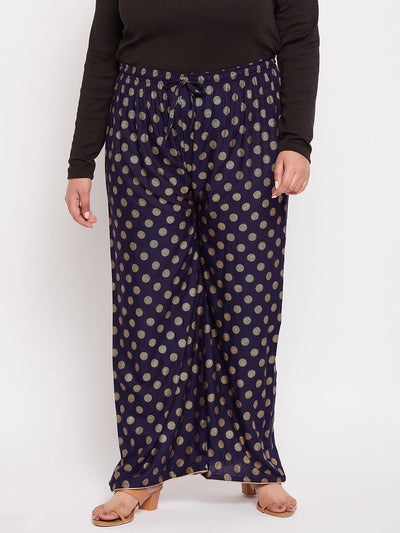 Navy blue polka dot printed palazzo with elasticated waistband and drawstring.