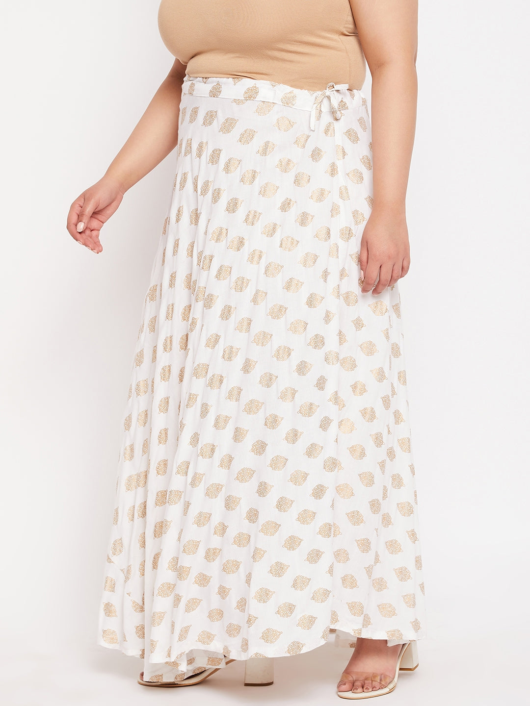 White printed flared rayon skirt with drawstring waistband.