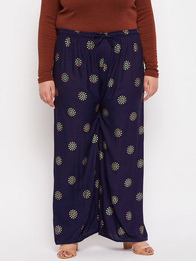 Navy blue printed rayon palazzo with elasticated waistband and drawstring.