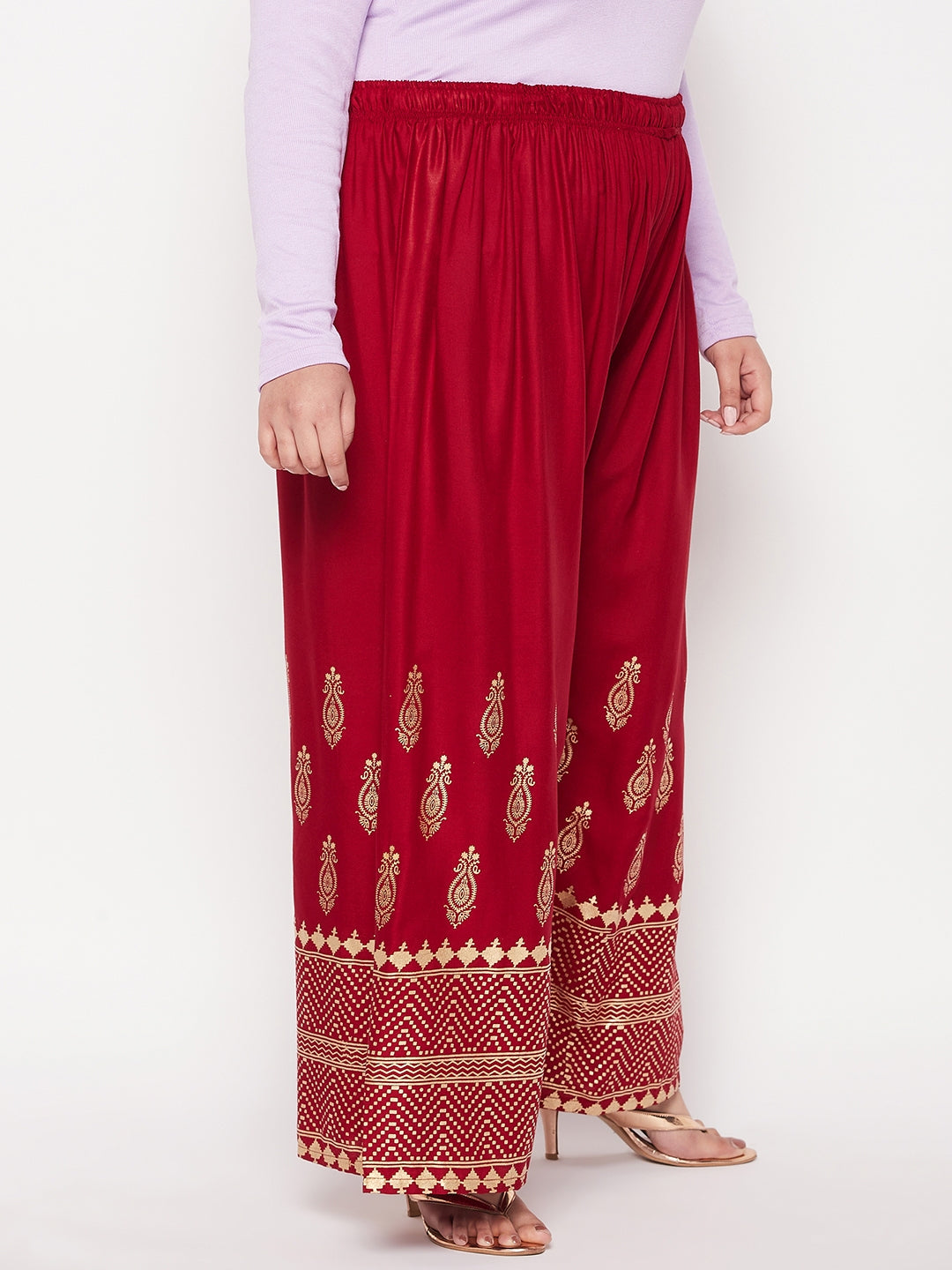 Maroon printed wide leg rayon palazzo with elasticated waistband.