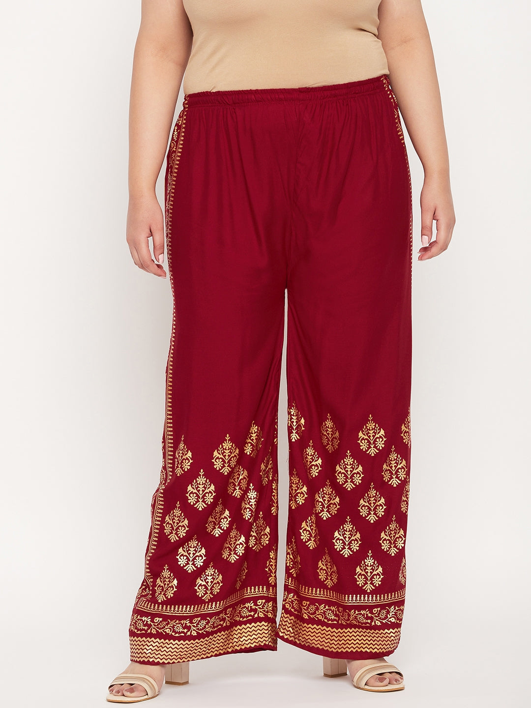 Maroon printed rayon palazzo with elasticated waistband and drawstring.