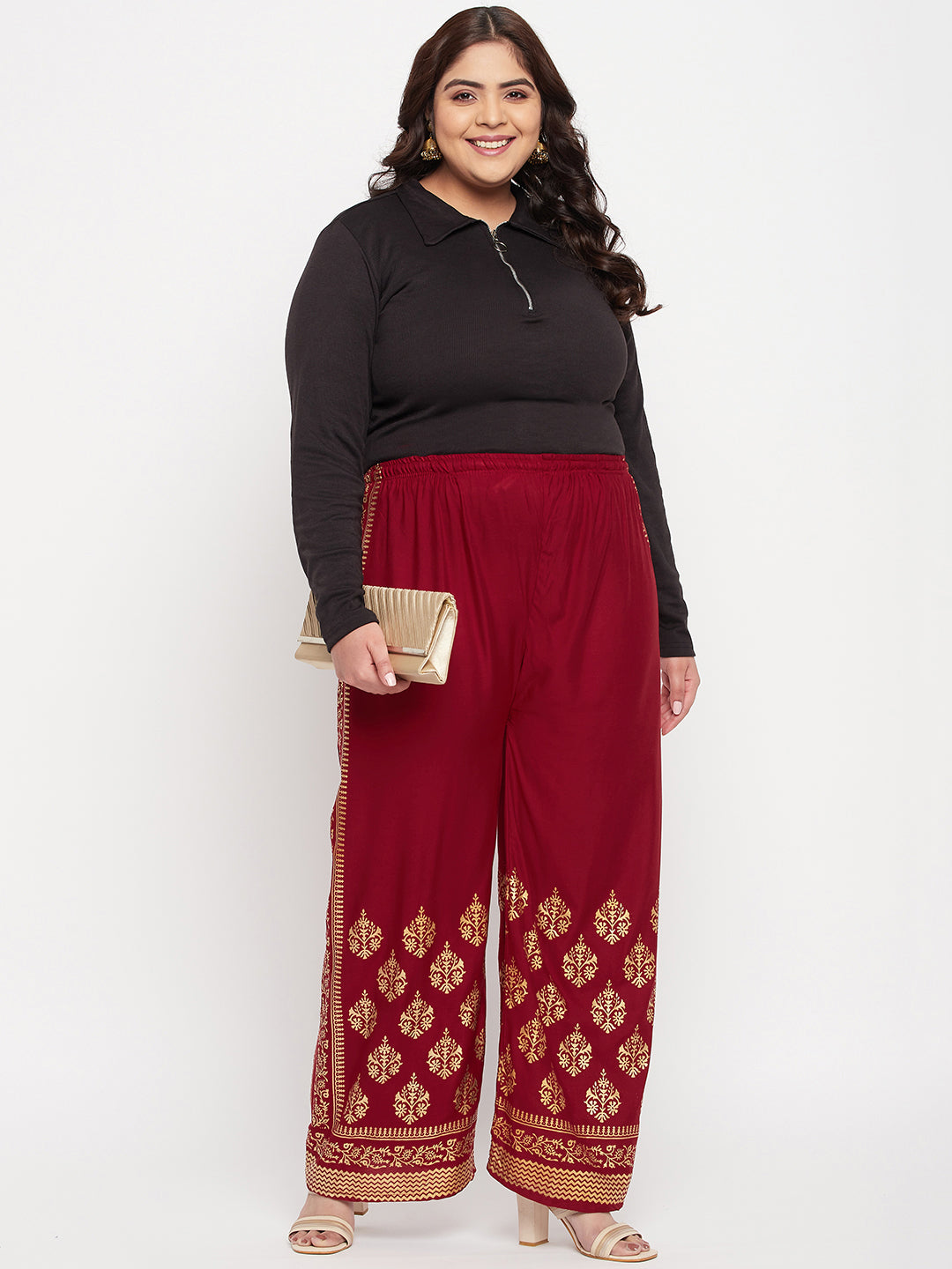 Maroon printed rayon palazzo with elasticated waistband and drawstring.