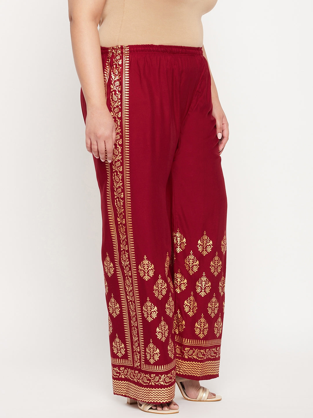 Maroon printed rayon palazzo with elasticated waistband and drawstring.