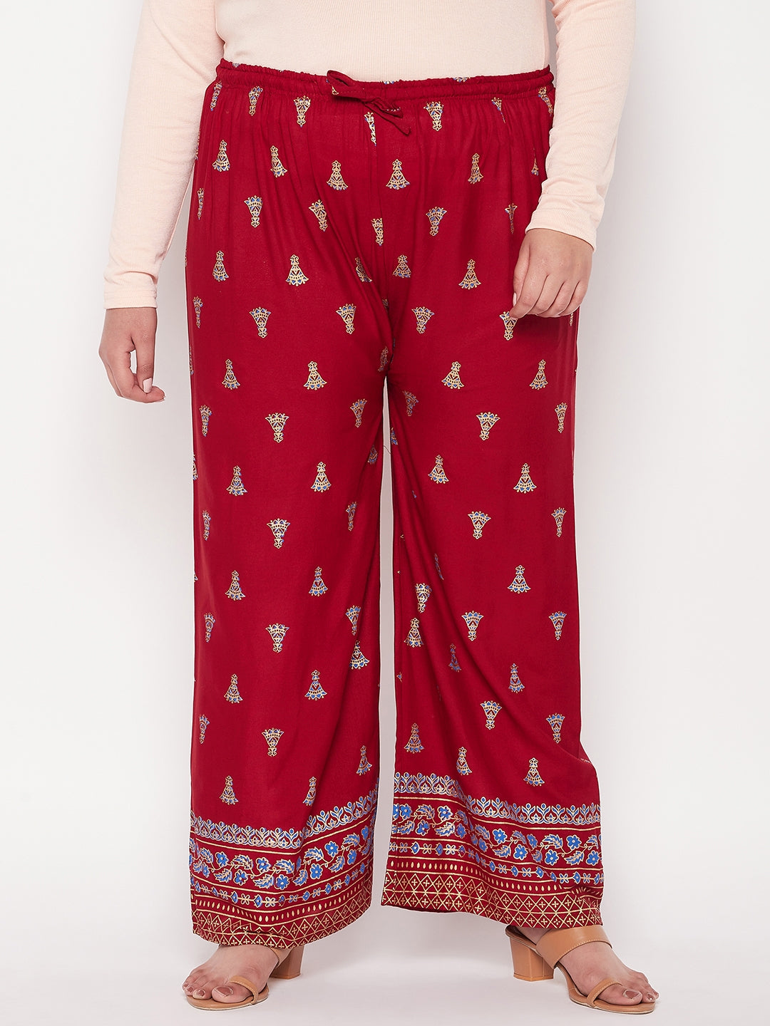 Maroon printed rayon straight palazzo with elasticated waistband and drawstring.