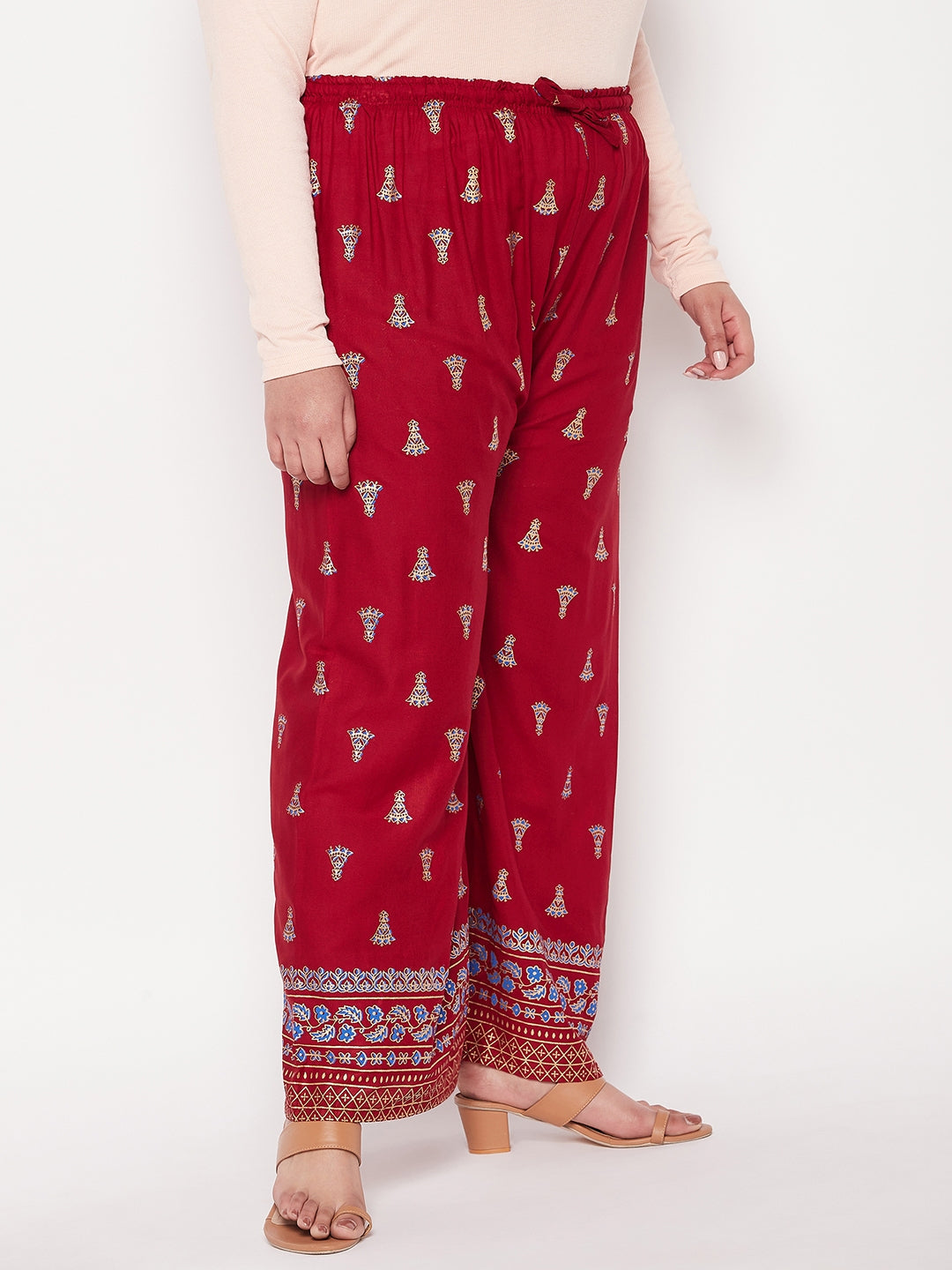 Maroon printed rayon straight palazzo with elasticated waistband and drawstring.