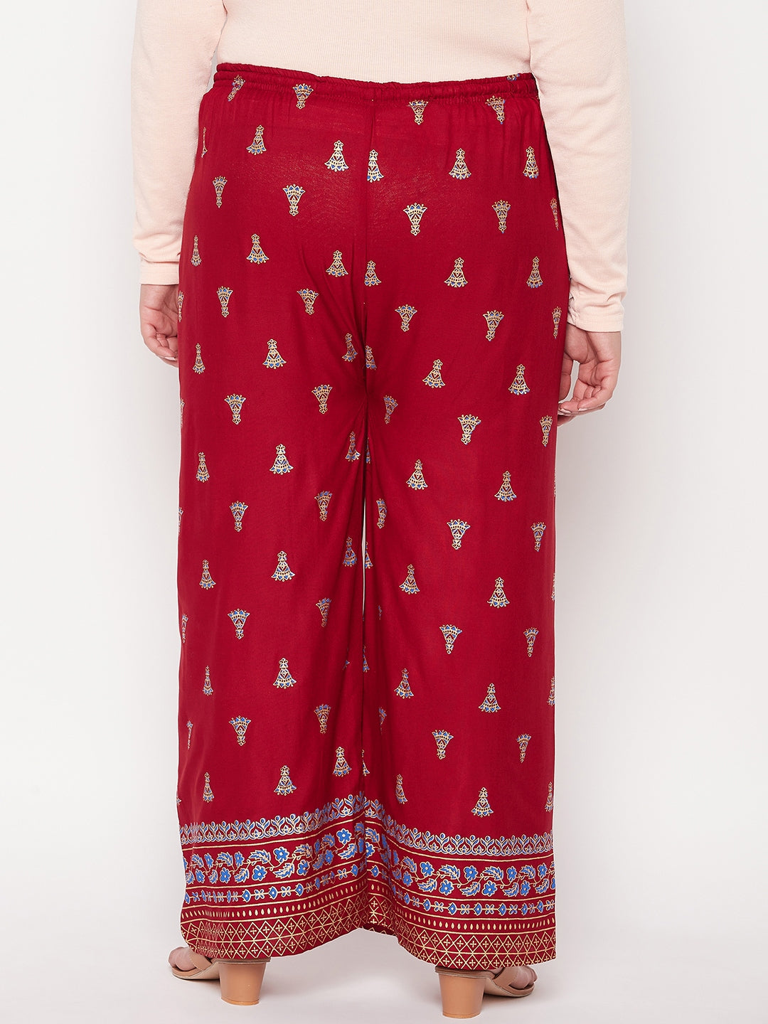 Maroon printed rayon straight palazzo with elasticated waistband and drawstring.