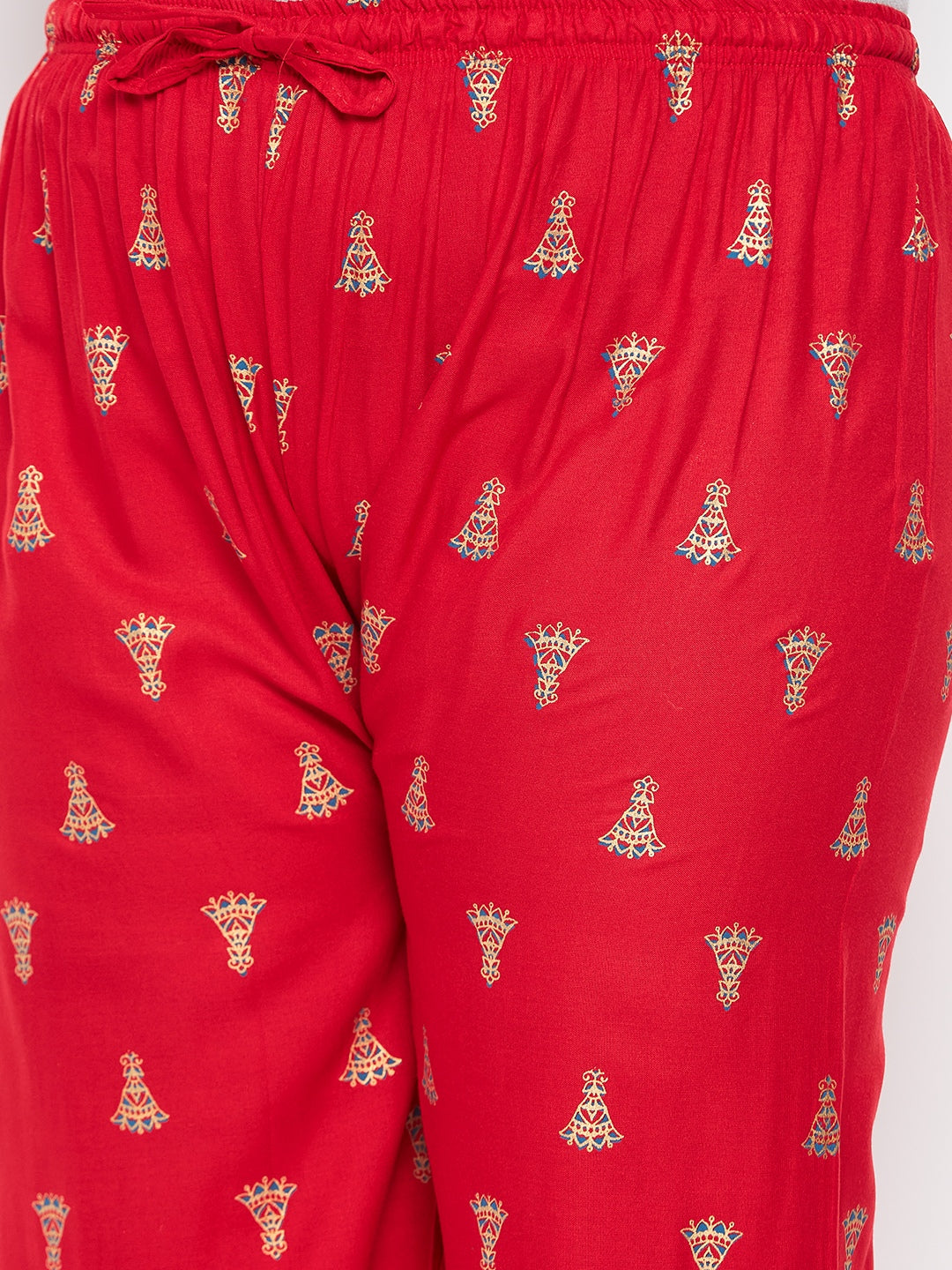 Red printed rayon straight palazzo pants with elasticated waistband and drawstring.