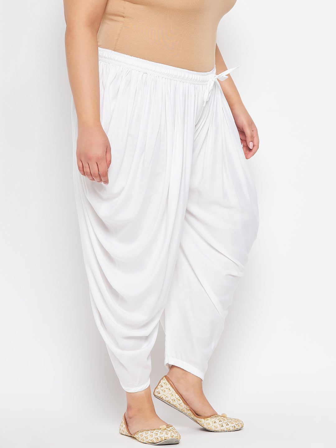 White solid rayon dhoti salwar with elasticated waistband.