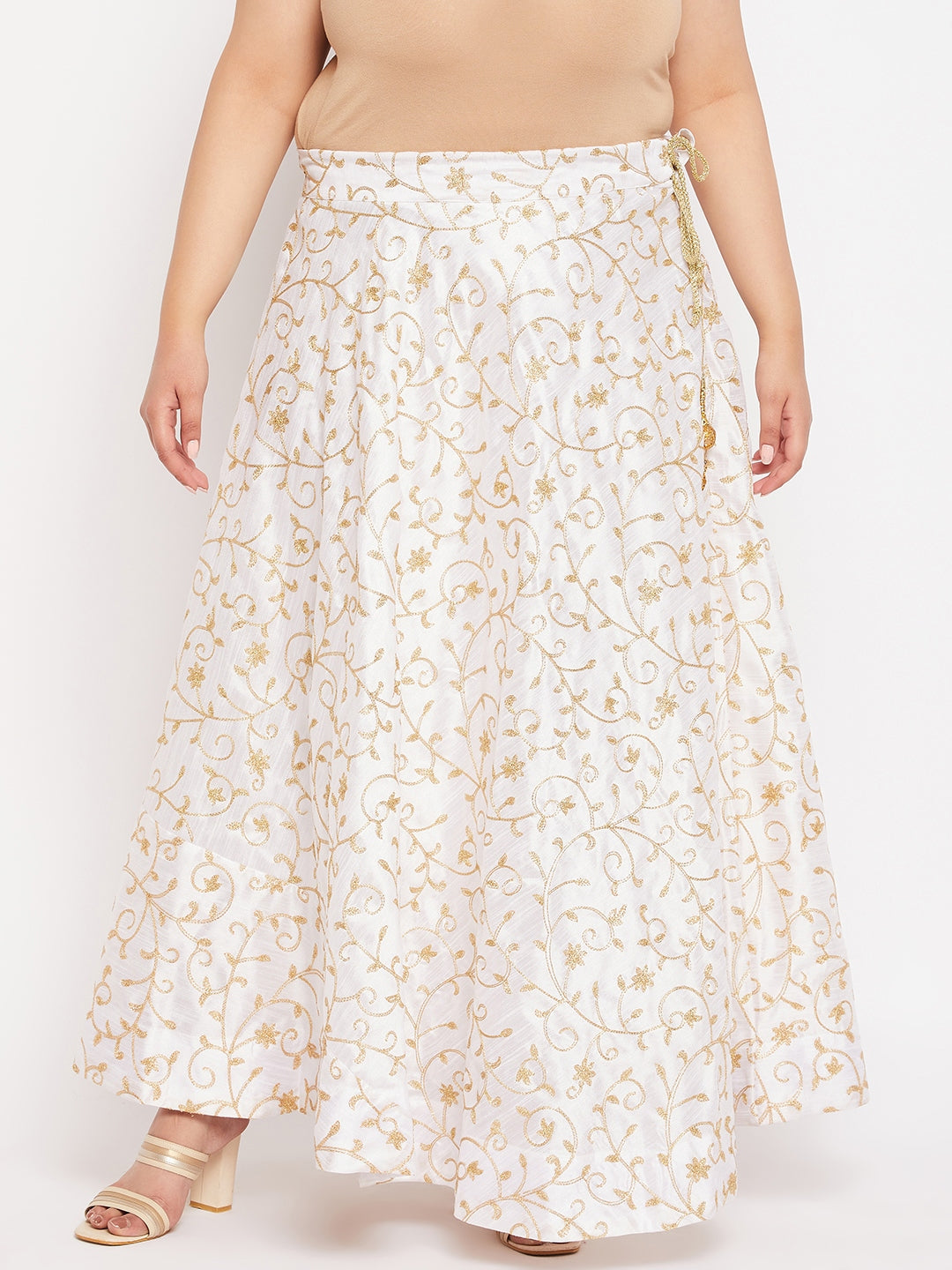 White and gold embroidered flared skirt with elasticated waistband and drawstring.