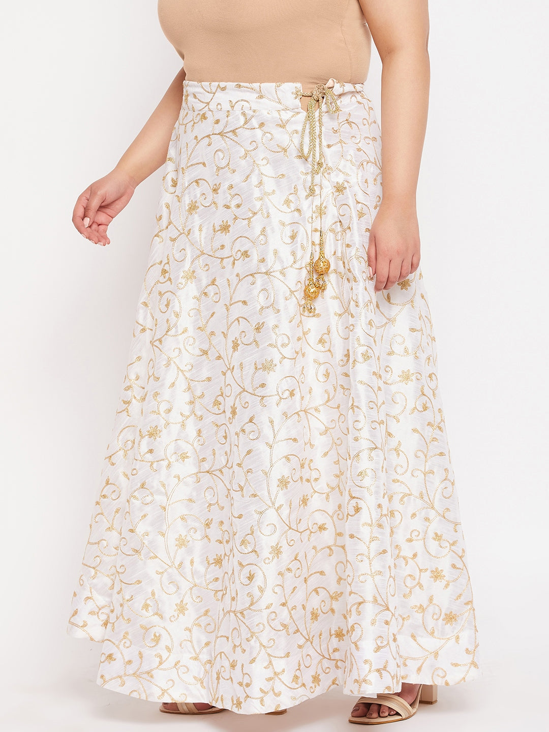 White and gold embroidered flared skirt with elasticated waistband and drawstring.