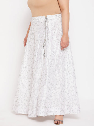 White and silver embroidered flared skirt with drawstring waistband.