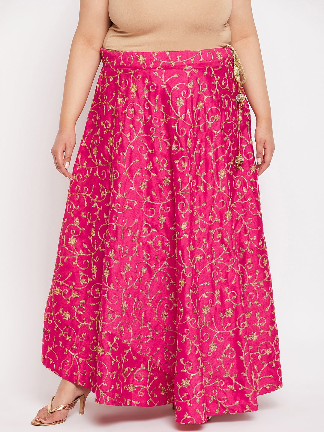 Magenta and gold embroidered flared skirt with drawstring waistband.