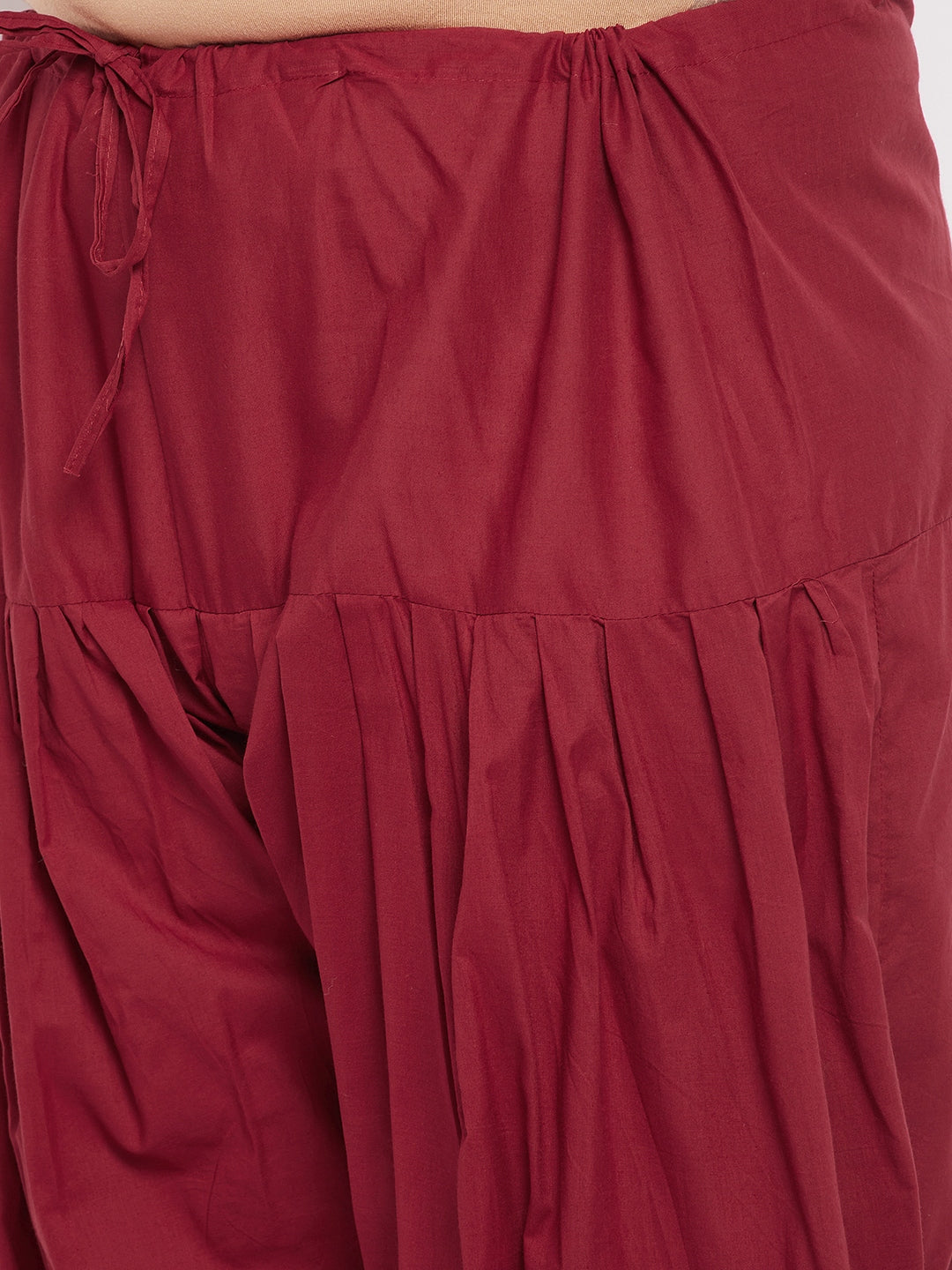 Maroon solid semi Patiala cotton salwar with drawstring waistband.